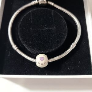 Pandora Authentic Sterling silver charm braclet with Mom charm.